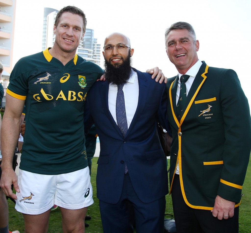 DURBAN, SOUTH AFRICA - AUGUST 07: Jean de Villiers with Hashim Amla and Heyneke Meyer (Head Coach) of South Africa during the Springbok team photo at the Beverly Hills Hotel on August 07, 2015 in Durban, South Africa. (Photo by Steve Haag/Gallo Images)