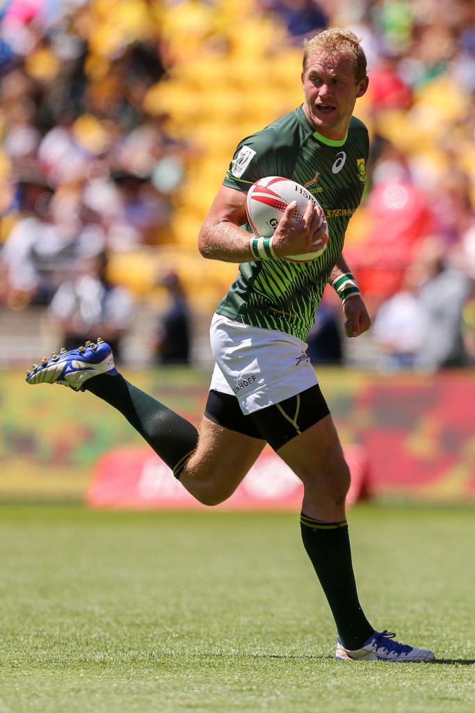 WELLINGTON, NEW ZEALAND - JANUARY 31:  Philip Snyman of South Africa breaks away for a try during the 2016 Wellington Sevens cup quarter-final match between Australia and South Africa at Westpac Stadium on January 31, 2016 in Wellington, New Zealand.  (Photo by Hagen Hopkins/Getty Images)