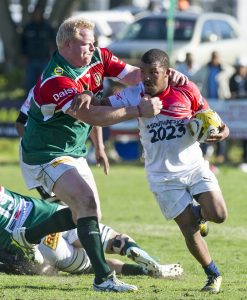 CAPE TOWN, SOUTH AFRICA - SEPTEMBER 09: Percival Williams of Roses United and Ashley Wells of False Bay during the Gold Cup match between DirectAxis False Bay and Roses United at Phillip Herbstein on September 09, 2017 in Cape Town, South Africa. (Photo by Peter Heeger/Gallo Images)