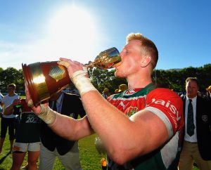 CAPE TOWN, SOUTH AFRICA - OCTOBER 28: General view of False Bay players celebrating with the Gold Cup Trophy after winning the Gold Cup, Final match between Direct Axis False Bay and Go Nutz College Rovers at Philip Herbstein Field, Constantia on October 28, 2017 in Cape Town, South Africa. (Photo by Ashley Vlotman/Gallo Images)