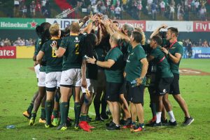 DUBAI, UNITED ARAB EMIRATES - Saturday 2 December 2017, the team celebrate with the trophy after winning the HSBC Emirates Airline Dubai Rugby Sevens Cup final match between South Africa and New Zealand at The Sevens Stadium in Dubai. Photo by Roger Sedres/ImageSA