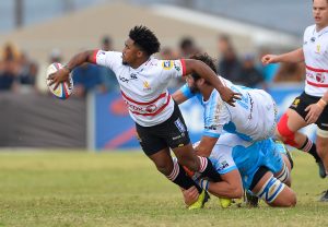 OUDSTHOORN, SOUTH AFRICA - MAY 20: Ashlon Davids of Golden Lions XV offloads during the SuperSport Rugby Challenge match between Vodacom Blue Bulls and Xerox Golden Lions XV at Bridgton Sports Ground on May 20, 2018 in Oudsthoorn, South Africa. (Photo by Ashley Vlotman/Gallo Images)